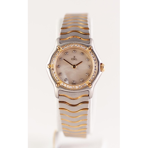 91 - EBEL LADY'S SWISS STAINLESS STEEL BI-COLOURED WRIST WATCH with mechanical movement, the mother of pe... 