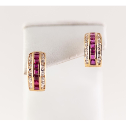 278 - PAIR OF 18ct GOLD, RUBY AND DIAMOND HALF HOOP PATTERN EARRINGS for pierced ears, each set with a cen... 