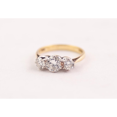 280 - 18ct GOLD RING CLAW SET WITH THREE ROUND BRILLIANT CUT DIAMONDS the centre diamond approximately 0.7... 