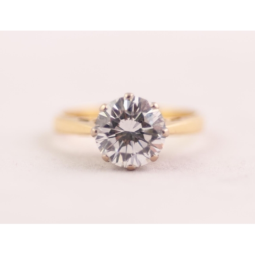 281 - 18 ct GOLD RING WITH A ROUND BRILLIANT CUT SOLITAIRE DIAMOND in an eight claw setting, approximately... 