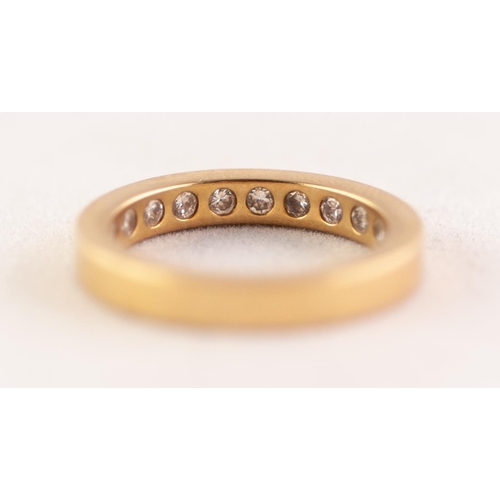 282 - 18 ct GOLD AND DIAMOND ETERNITY RING the straight sided band gypsy set on the inside of the band wit... 