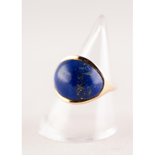 283 - 14 ct GOLD RING COLLET SET WITH A LARGE CABOCHON OVAL LAPISE LAZULI 6.9 gms gross, ring size 