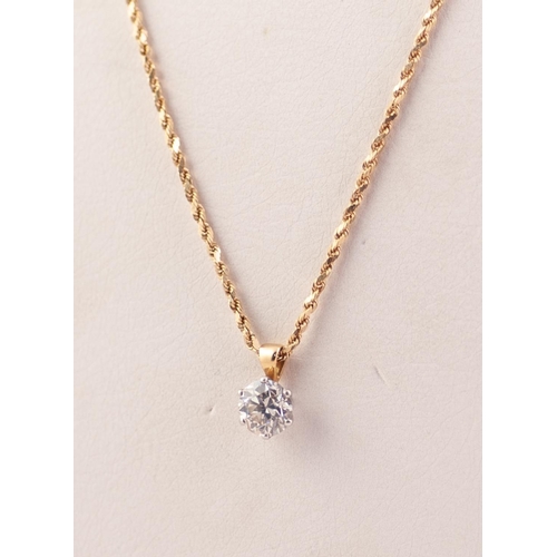 284 - YELLOW AND WHITE GOLD PENDANT CLAW SET WITH A ROUND BRILLIANT CUT SOLITAIRE DIAMOND approximately 2 ... 