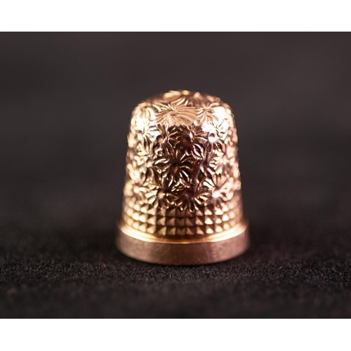 257 - POST WAR 9ct GOLD THIMBLE size 8, Birmingham 1967, 5 gms in an EGG SHAPED BLACK LEATHER AND GILT MET... 