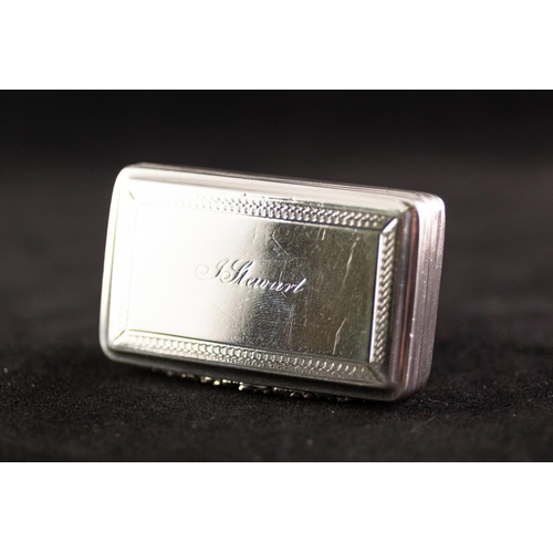 250 - A WILLIAM IV SILVER SNUFF BOX, engine turned and with embossed floriated thumb piece, the cover engr... 