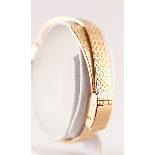 109 - LADY'S ROTARY QUARTZ GOLD PLATED BRACELET WATCH, the rounded oblong dial with batons, integral flexi... 