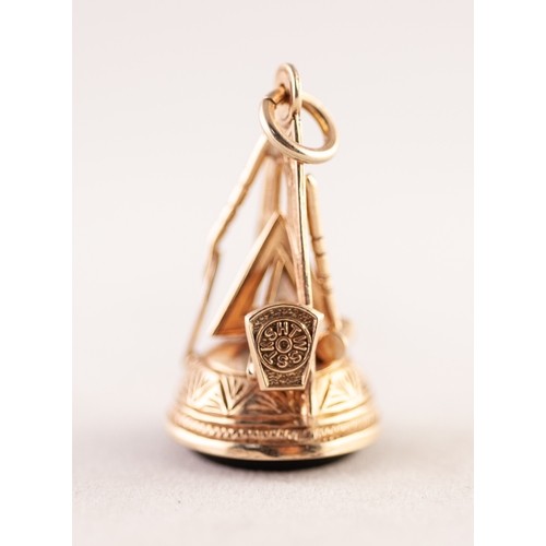 263 - VICTORIAN 9ct GOLD MASONIC FOB SEAL, the shaft modelled as Masonic working tools, the base set with ... 