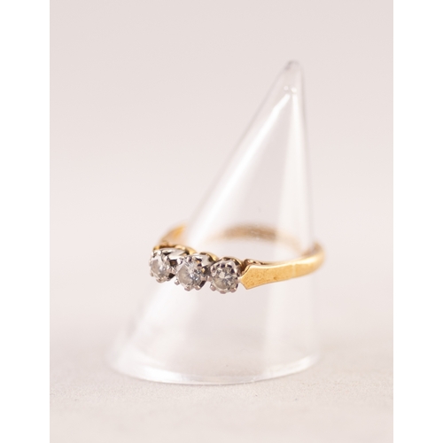 349 - 18ct GOLD RING CLAW SET WITH THREE ROUND BRILLIANT CUT DIAMONDS, approximately .45 ct in total, 3 gm... 