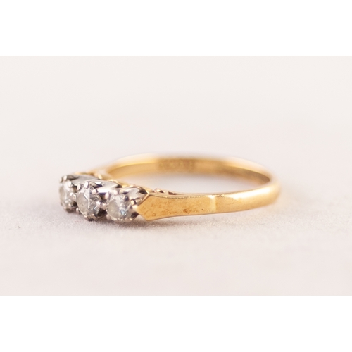 349 - 18ct GOLD RING CLAW SET WITH THREE ROUND BRILLIANT CUT DIAMONDS, approximately .45 ct in total, 3 gm... 