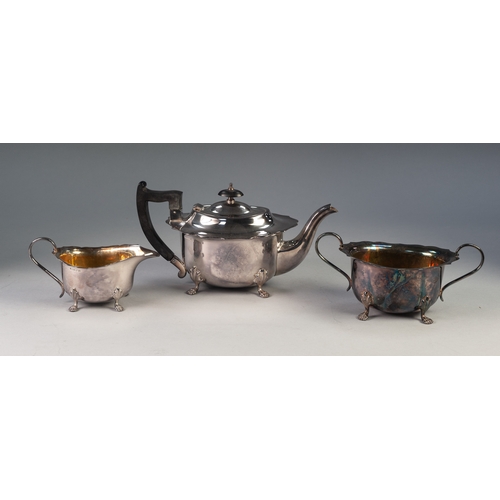 759 - THREE PIECE ELECTROPLATED TEA SET, of oval form with cyma borders, angular scroll handles and scroll... 