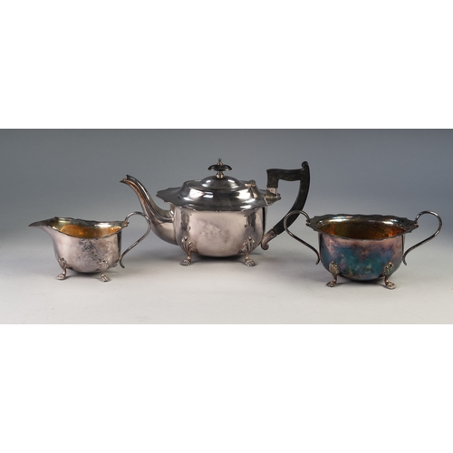 759 - THREE PIECE ELECTROPLATED TEA SET, of oval form with cyma borders, angular scroll handles and scroll... 