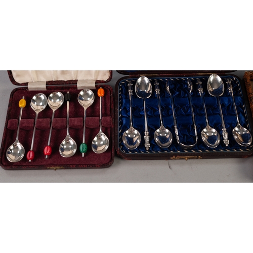 749 - A CASED SET OF SIX PLATED TEASDPOONS, with matching  SUGAR TONGS, with figure terminals, a  CASED SE... 