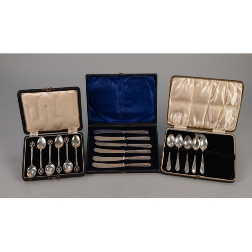 749 - A CASED SET OF SIX PLATED TEASDPOONS, with matching  SUGAR TONGS, with figure terminals, a  CASED SE... 