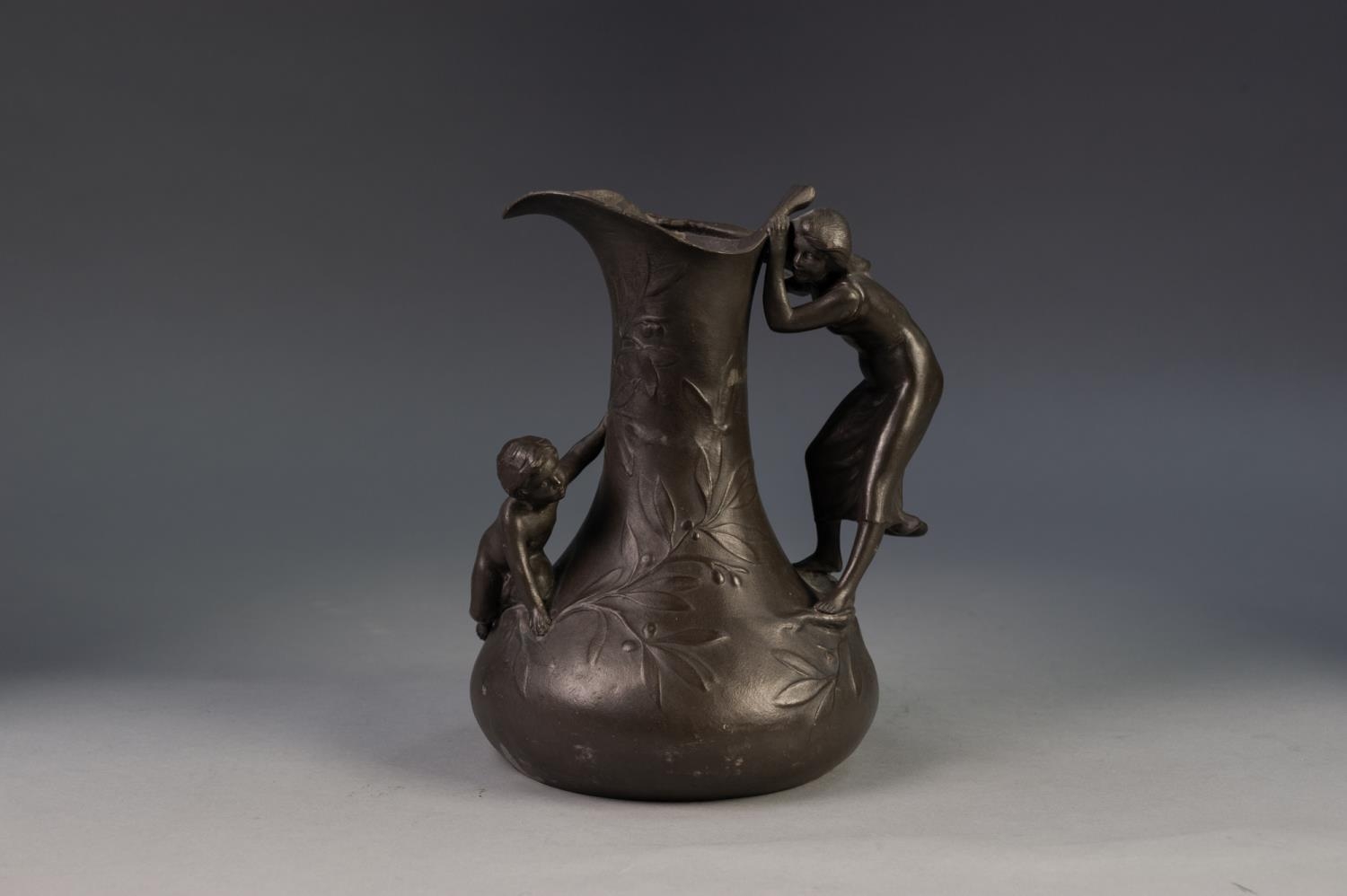 ETAIN GARANTI, FRENCH ART NOUVEAU MOULDED AND EMBOSSED PEWTER JUG