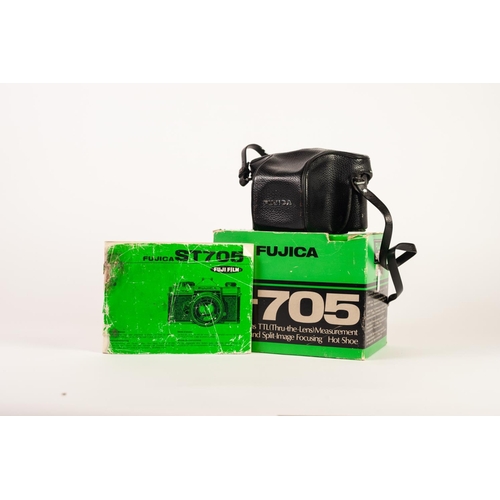 102 - FUJICA ST705 SLR ROLL FILM CAMERA, with 55mm f1.8 LENS, in original box with instructions, together ... 