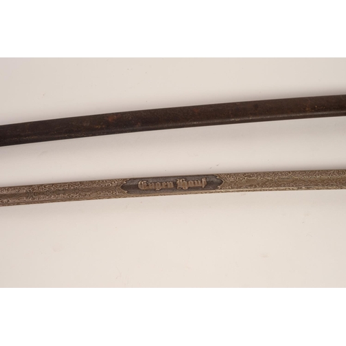 67 - MID 20th CENTURY GERMAN OFFICER'S DRESS SWORD, the curved blade stiched with scrolls and text 'Engen... 