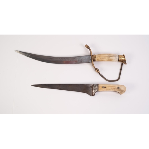 73 - MIDDLE EASTERN KNIFE AND SCABBARD, with acid etched trailing point blade and brass mounted horn hand... 