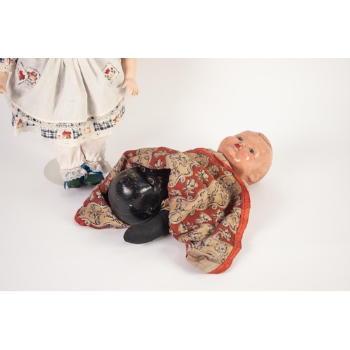 181 - PRE-WAR COMBINED BLACK AND WHITE BABY DOLL, painted composition heads with moulded detail shared bod... 