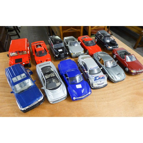 150 - TWELVE APPROXIMATELY 1:18 SCALE DIE CAST MODELS OF LATE 20th CENTURY CARS AND MPVs, makers include M... 