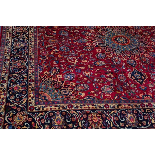 6 - MESHED PERSIAN CARPET with floral and petal shaped circular centre medallion with pendants and match... 