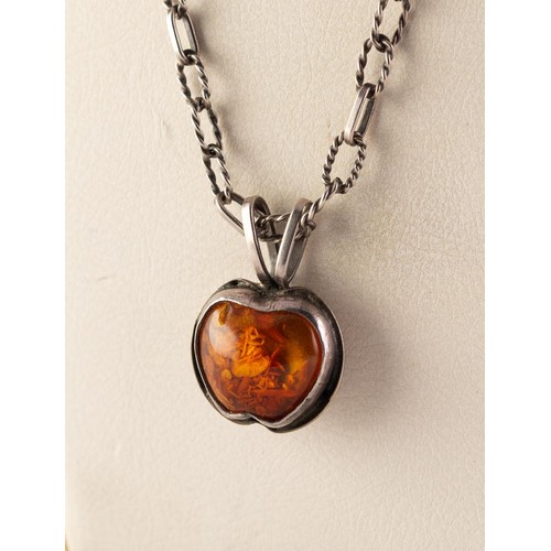 58 - ORNO, WARSAW, CRAFT SILVER AND AMBER PENDANT ON AN ORNO SILVER CHAIN NECKLACE with rope pattern and ... 