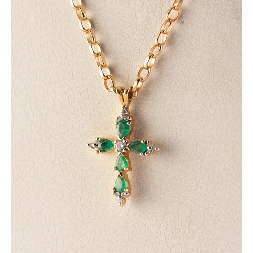 55 - 18ct GOLD, EMERALD AND DIAMOND CROSS PENDANT, set with a small centre diamond, approximately 0.07ct,... 