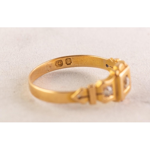 83 - VICTORIAN 18ct GOLD RING set with three small diamonds, the centre diamond in a square setting and s... 