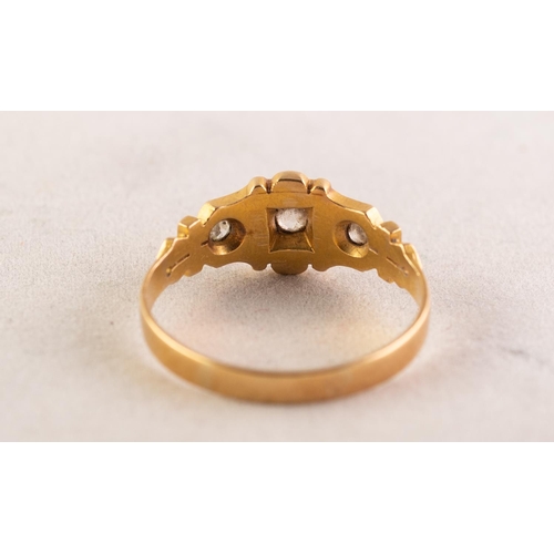 83 - VICTORIAN 18ct GOLD RING set with three small diamonds, the centre diamond in a square setting and s... 