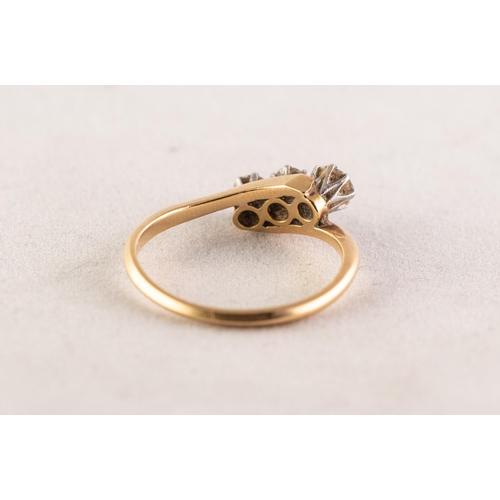 86 - 18ct GOLD CROSS-OVER RING set with three old cut diamonds, each approximately 0.20ct, 0.60ct in tota... 