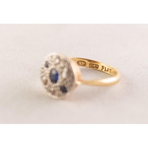 94 - 18ct GOLD AND PLATINUM RING, the circular top pave set with three sapphires and four small diamonds,... 