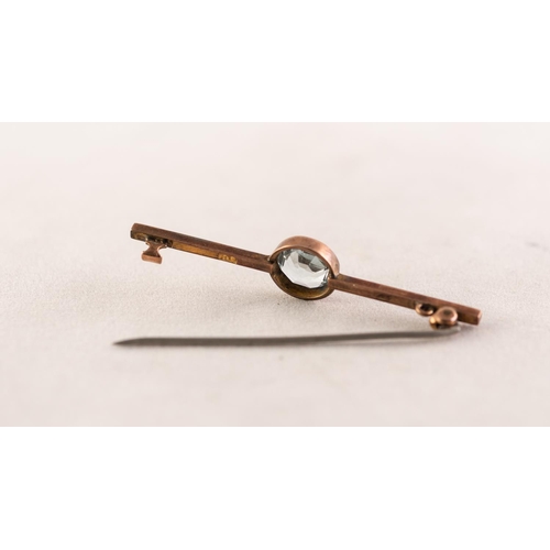 96 - 9ct GOLD BAR BROOCH, the centre collet set with a circular aquamarine, 2in (5cm) wide, 3 gms