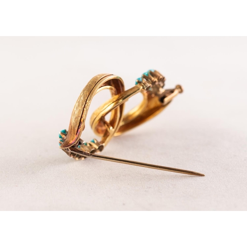 69 - 18ct GOLD AND TURQUOISE BROOCH comprising two interlocking cornucopia shaped circles and two curved ... 