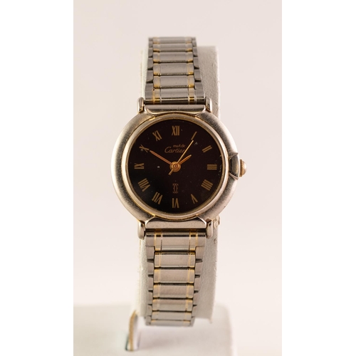 9 - LADY'S MUST DE CARTIER WHITE METAL PARCEL GILT CASED QUARTZ WRISTWATCH with black dial and adjustabl... 