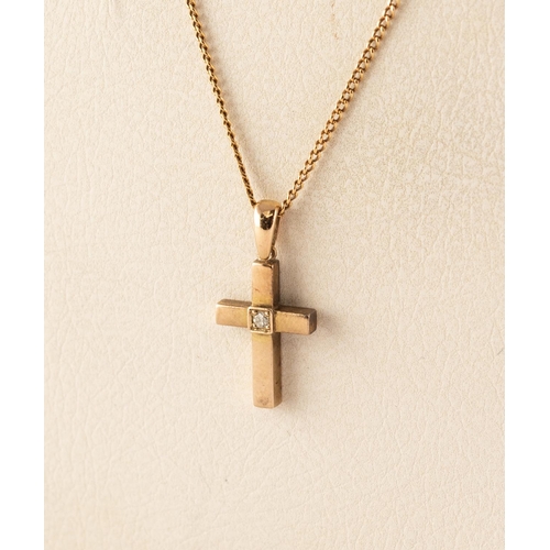 52 - 9ct GOLD TINY DIAMOND SET CRUCIFIX on an 18ct GOLD FINE CHAIN, 3.8 gms all in