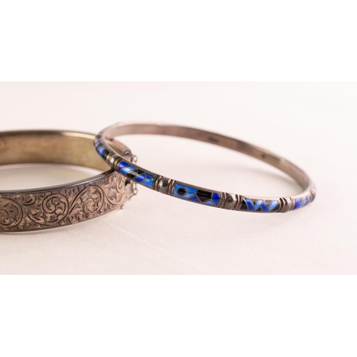 48 - FOUR SILVER STIFF BANGLES, 2 3/4ozs all in (4)