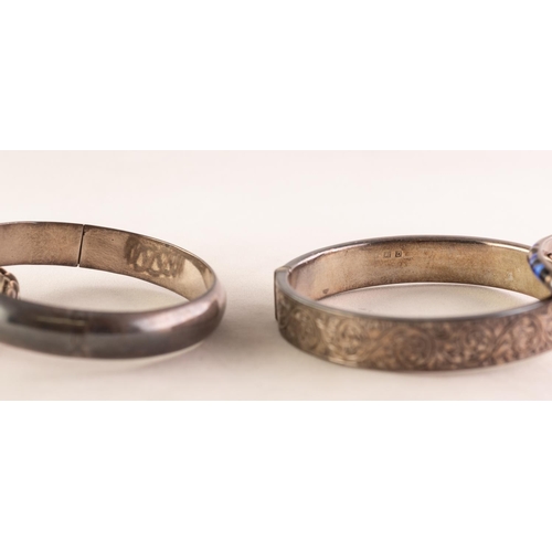 48 - FOUR SILVER STIFF BANGLES, 2 3/4ozs all in (4)