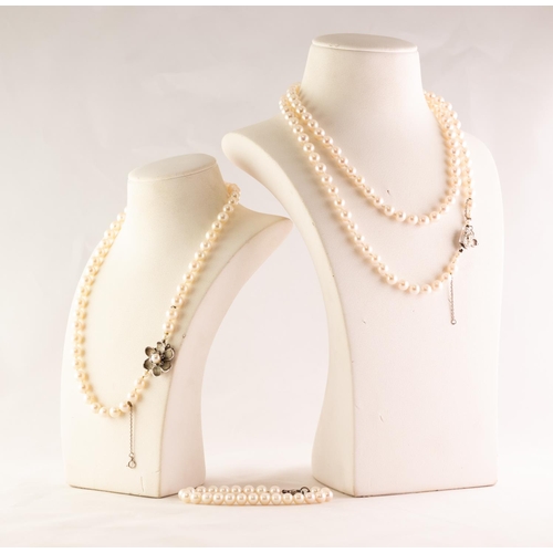 49 - TWO CULTURED PEARL NECKLACES and a cultured pearl BRACELET with silver clasps (3)