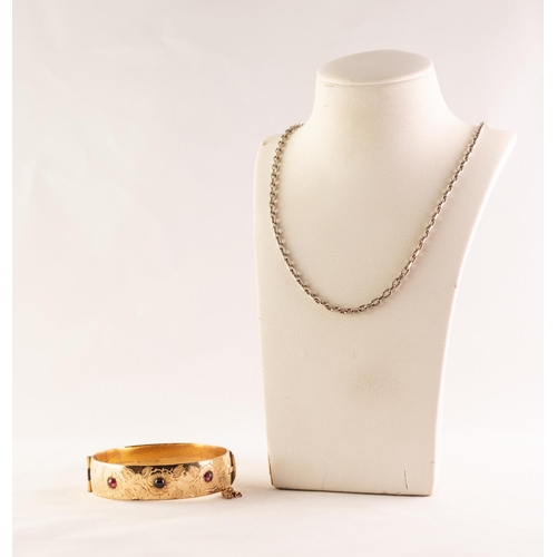 40 - GOLD PLATED ON METAL CORE RED CABOCHON STONE SET STIFF BANGLE and a silver CHAIN (2)