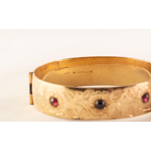 40 - GOLD PLATED ON METAL CORE RED CABOCHON STONE SET STIFF BANGLE and a silver CHAIN (2)