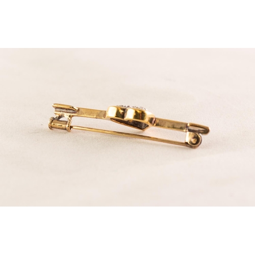 58 - GOLD COLOURED METAL CUPID'S ARROW PIERCING A HEART set with six tiny diamonds, 3.7 gms gross
