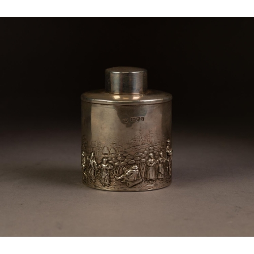228 - GEORGE V EMBOSSED SILVER TEA CADDY RETAILED BY FINNIGANS OF MANCHESTER, of cylindrical form with pul... 