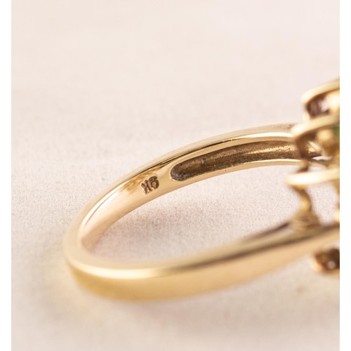 99 - 9ct GOLD CITRINE AND OLIVINE FLORAL CLUSTER RING, set with small circular centre citrine and surroun... 