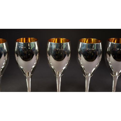 184 - GARRARD & Co Ltd SET OF SEVEN SILVER GOBLETS, including: A CASED SET OF SIX, each of tulip form ... 
