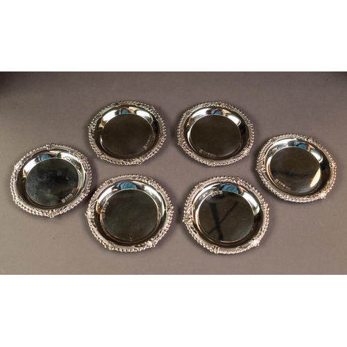 185 - SET OF SIX IRISH SILVER COASTERS WITH SPECIAL SWORD OF LIGHT HALLMARK, each with plain centre and sh... 
