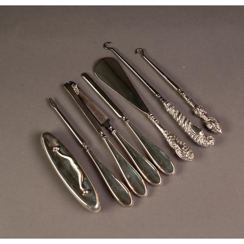 187 - FIVE PIECE SILVER CLAD NAIL MANICURE SET, including buffer, together with TWO BUTTON HOOKS WITH FANC... 