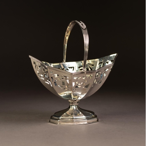 193 - LATE VICTORIAN SWING HANDLED PEDESTAL SUGAR BASKET, of panelled oval form with reeded handle and con... 