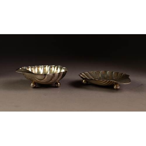 201 - TWO SIMILAR EARLY TWENTIETH CENTURY SILVER SHELL PATTERN BUTTER DISHES both with ball feet, Sheffiel... 