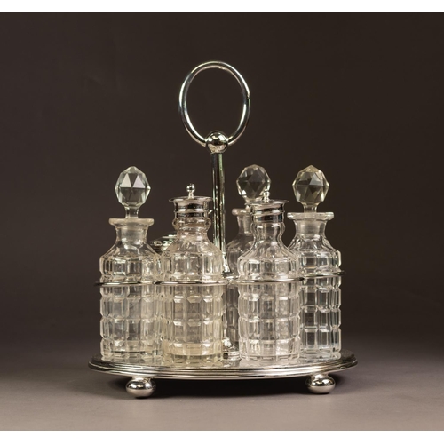 236 - ELECTROPLATED SIX BOTTLE CRUET STAND, of oval form with moulded border, compressed ball feet and loo... 