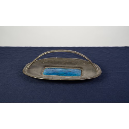 33A - ARCHIBALD KNOX FOR LIBERTY, ENAMELLED PEWTER CAKE BASKET, of rounded oblong form with central strap ... 