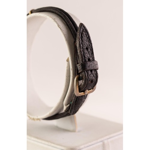 28 - LADY'S VERTEX REVUE 9ct GOLD WRISTWATCH with small circular silvered dial with four arabic numerals ... 